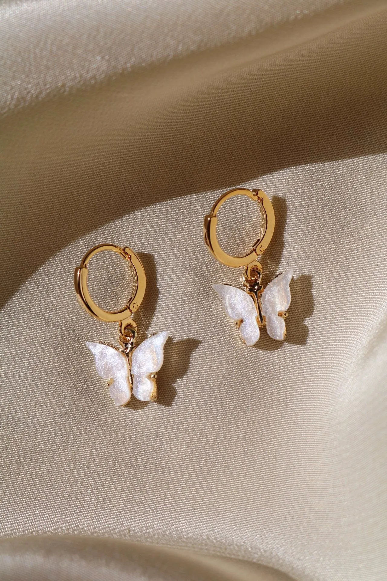 Pearl Butterfly Huggie Earrings